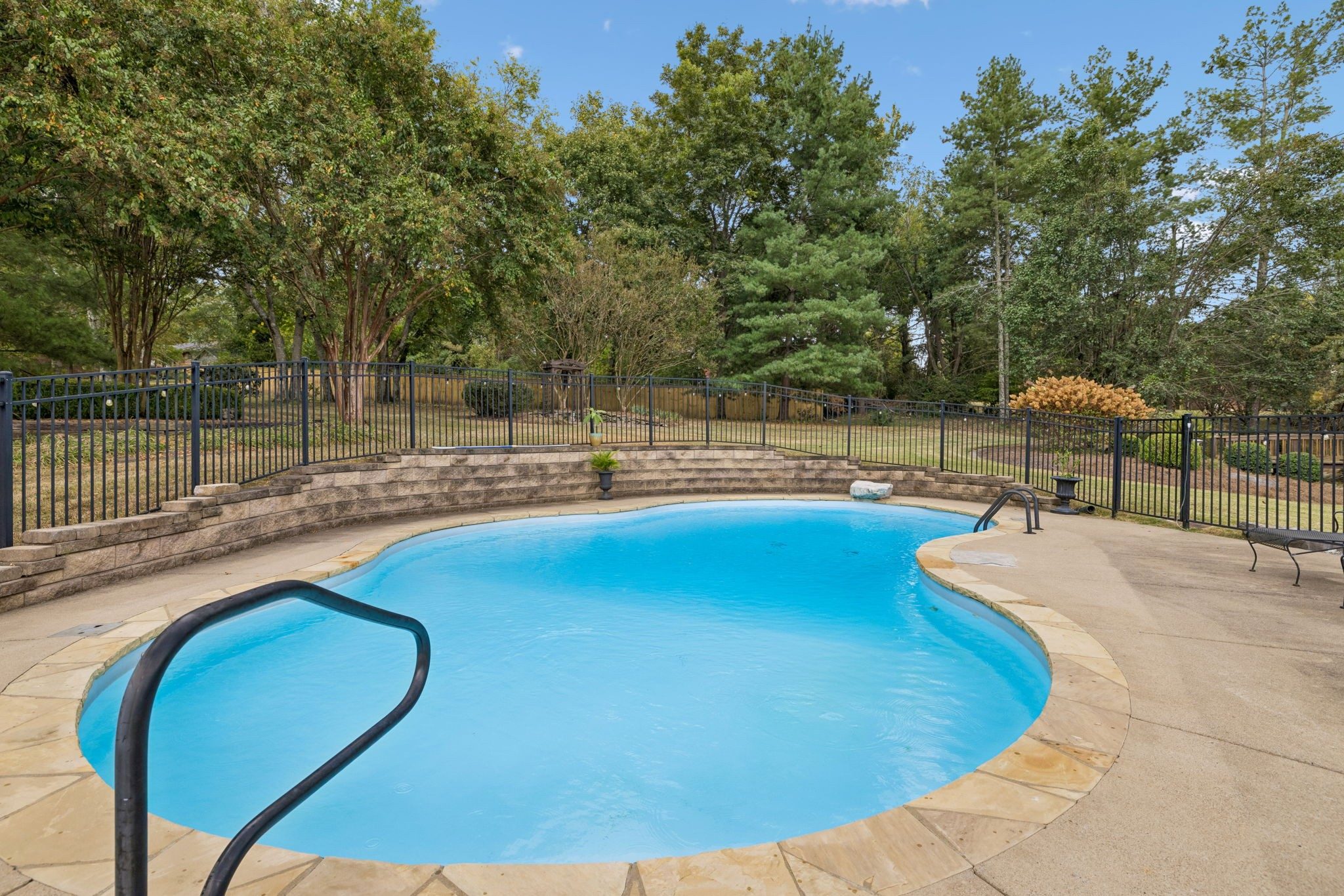 Fenced swimming pool in the backyard at 1514 Knox Valley Drive, Brentwood TN