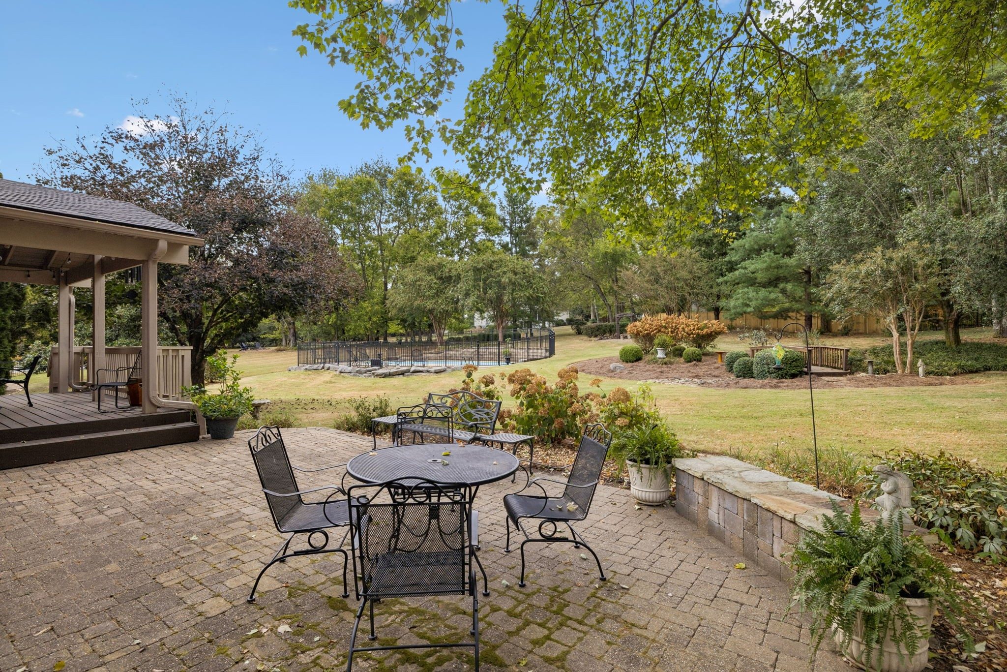 Back patio and tree lined yard at 1514 Knox Valley Drive, Brentwood TN
