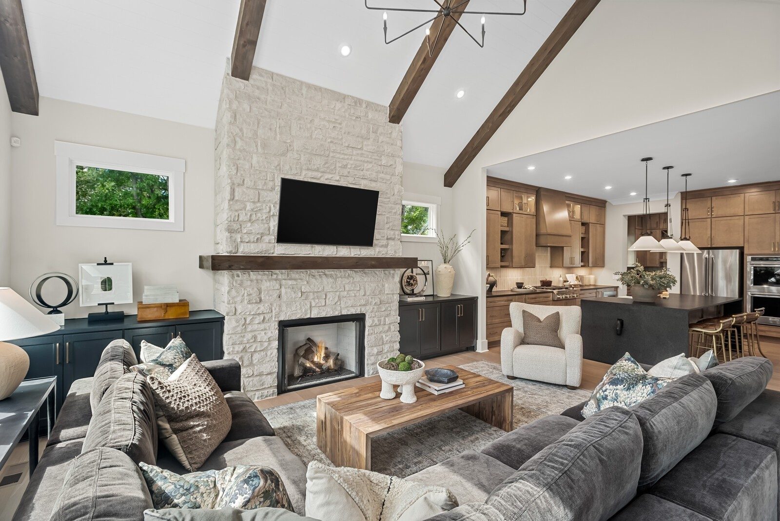 Representative model: family room with tall ceilings and large windows in a Belterra model home in another community, not 1600 Wisconsin Avenue, Brentwood TN