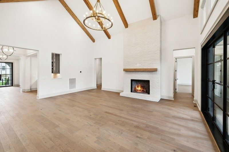 Representative photo: family room with a vaulted beamed ceiling in an Elmsley plan home, not 1817 Dartmouth Drive, Brentwood TN
