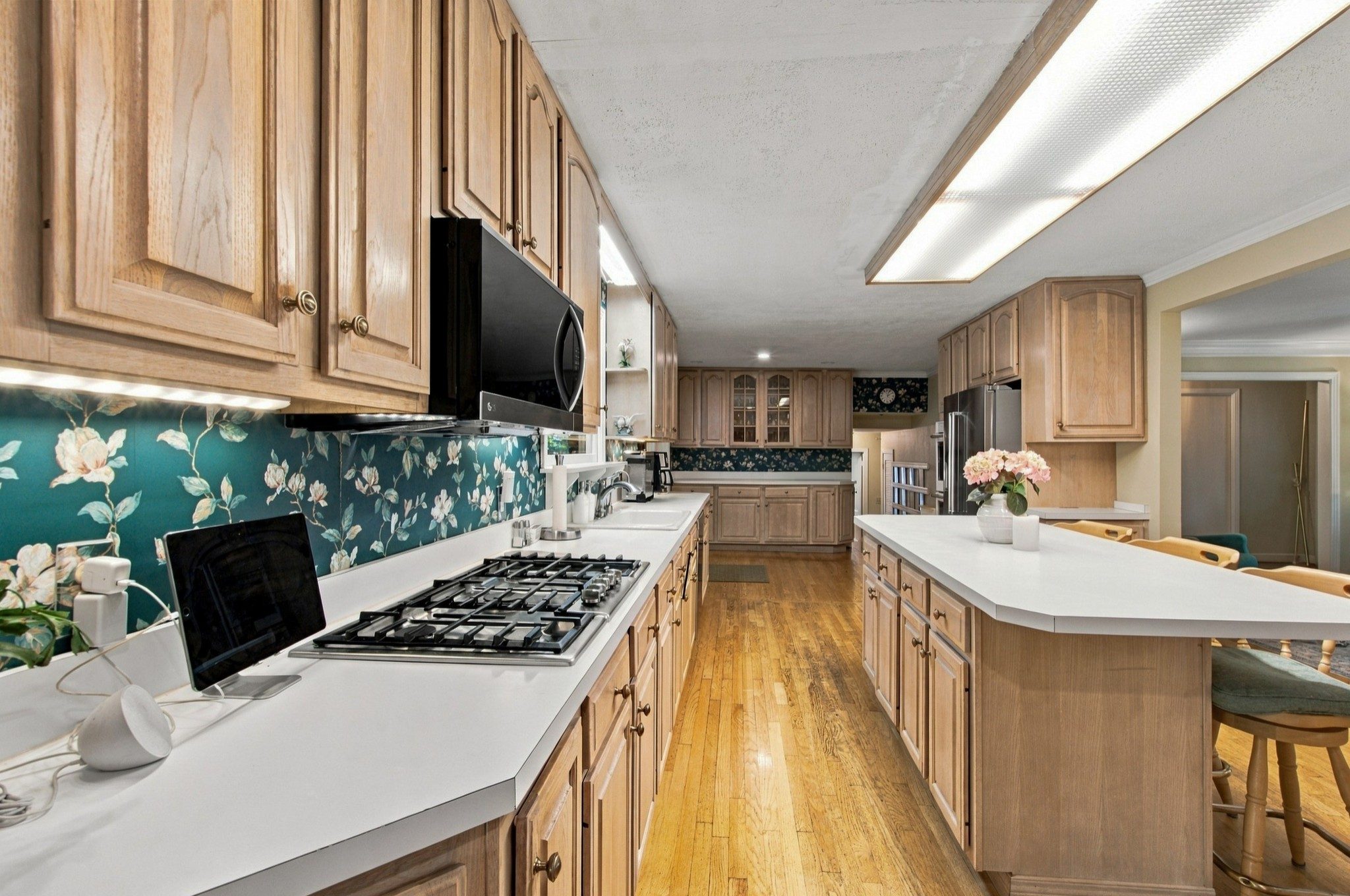 Kitchen with wood cabinets and a tiled backsplash at 5312 Lancelot Road, Brentwood TN