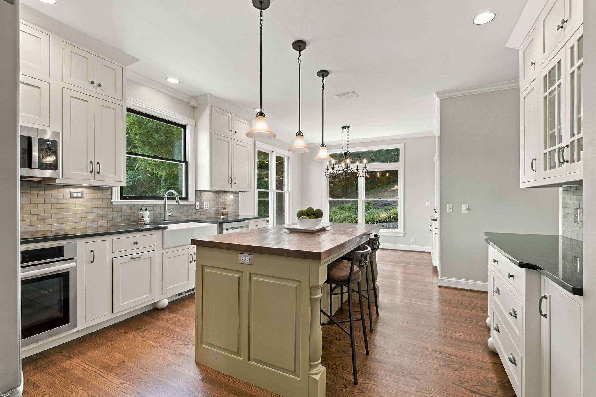 Kitchen with an island and pendant lights at 710 Ashley Run, Brentwood TN