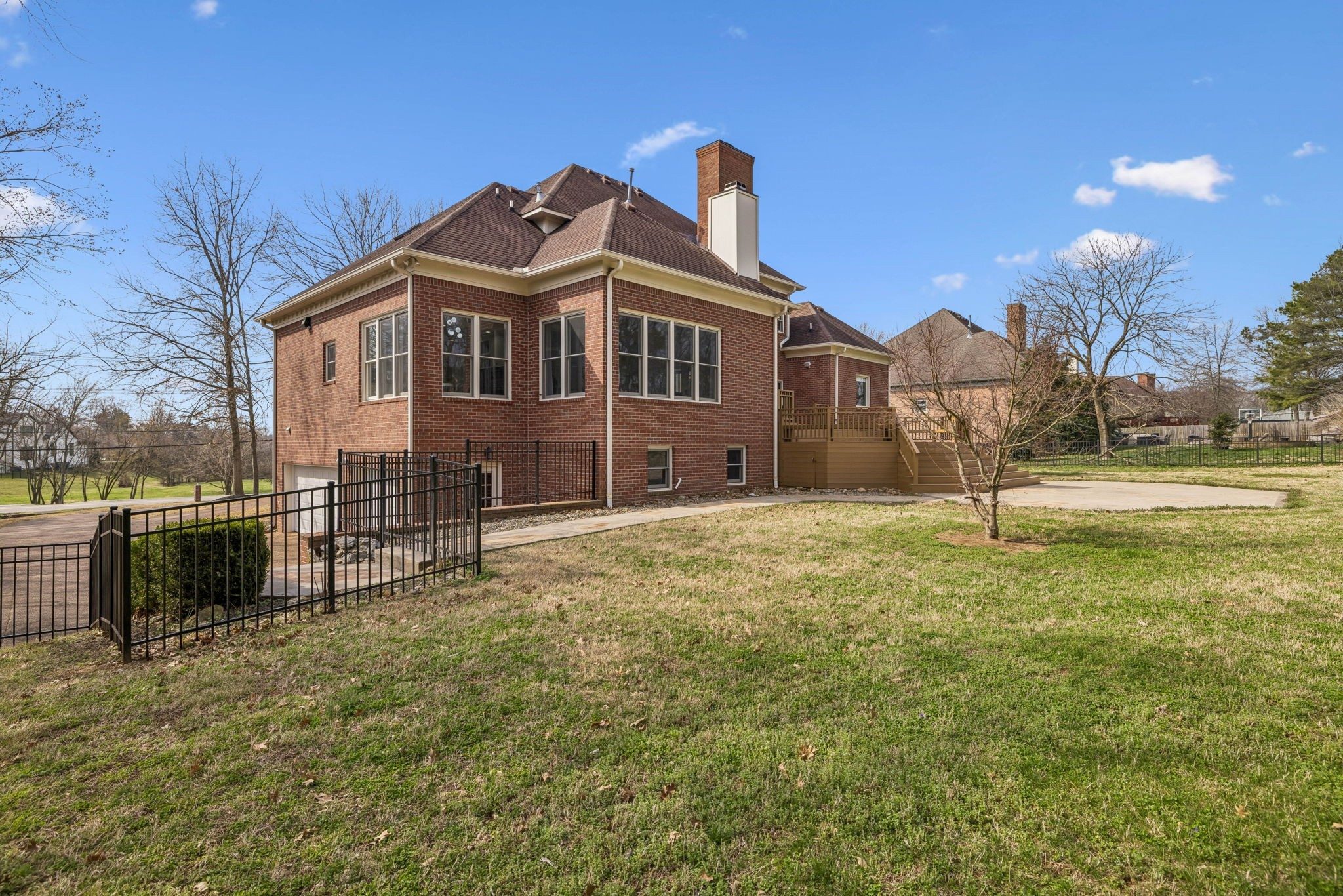 Rear brick exterior and lawn at 9004 Old Smyrna Road, Brentwood TN