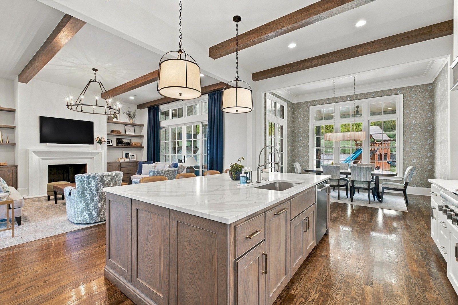 Kitchen with a large island and wood beams at 9265 Berwyn Court, Brentwood TN